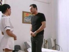 Busty Brunette Doctor Gives A Bodycheck