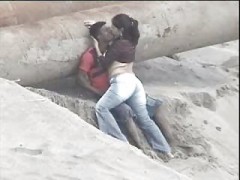 Latino Couple Caught On The Beach
