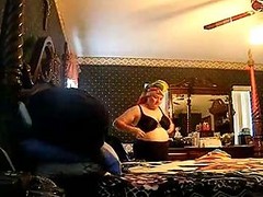 Friends Mom Putting On Her Bra