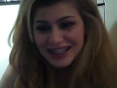 Blonde With A Plate On The Teeth Communicates Via Webcam